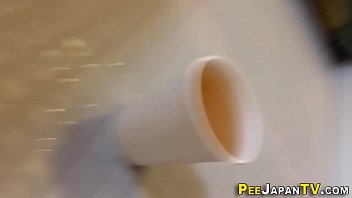 Fetish asian pees in cup